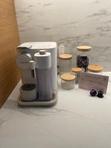 a coffee maker sitting on top of a counter at Le Grenier - Appartement vacances in Breil-sur-Roya +11 photos