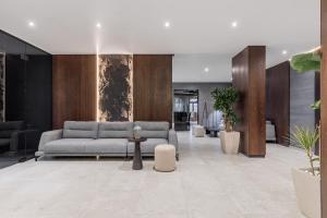 a living room with a couch and a table at Villa Elena SPA & Resort in Bukovel