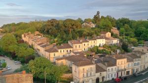 an aerial view of a town with houses at 1860 Bordeaux - Lormont house in Lormont
