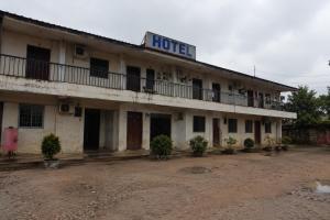 an old building with a hotel on top of it at NH hôtel in Antananarivo