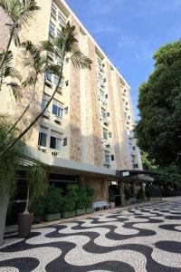 a large building with a design on the ground at Hotel Veredas in Paracatu