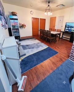 a kitchen and dining room with a table and a refrigerator at Yawen Homestay 雅文民宿 in Lanyu +19 photos