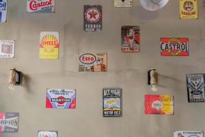 a white wall with many stickers on it at Lyon Cité Internationale - Loft Industriel Neuf in Caluire-et-Cuire +15 photos