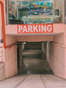 a parking sign in a store tunnel with a sign that reads parking at Bheemas Grand Ps9 in Srikalahasti