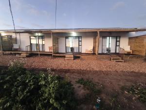 a house with a porch and a patio at Maphango Farms BnB in Alice