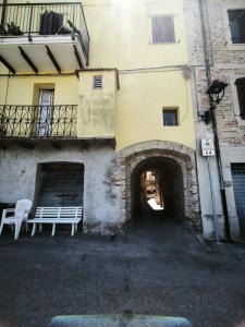 a bench sitting in front of a building at Due Orizzonti in Monsampolo del Tronto