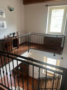 an overhead view of a room with a spiral staircase at A casa di Leyla in Monteluro