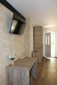 a kitchen with a counter and a sink in a room at La Brazi by BMD in Vulcan +30 photos