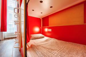 Cama o camas de una habitación en Adagio Private Rooms Downtown