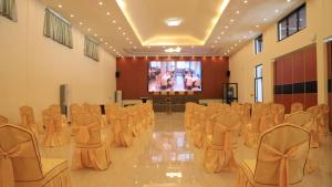 a conference room with chairs and a projection screen at Nile View Hotels in Bahir Dar
