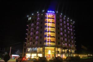 a building with lights on top of it at night at Nile View Hotels in Bahir Dar