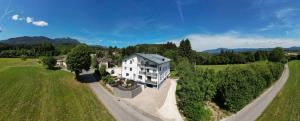 an aerial view of a large house in a field at Apartmenthotel Rosentaler Hof Quartier2 in Pirk