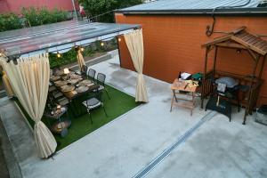 an overhead view of a patio with a table and chairs at Gatev House in Teteven