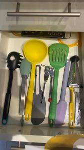 a drawer filled with lots of kitchen utensils at Ñireco HOUSE in San Carlos de Bariloche