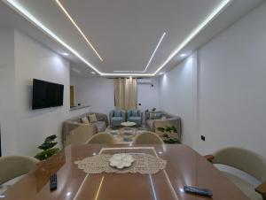 a conference room with a table and chairs at Azmouni in Midoun