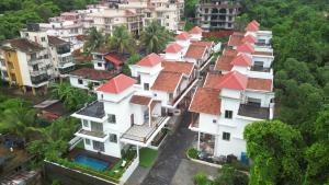 an aerial view of houses with red roofs at Luxury 3BHK Villa with Private Pool & PS5 in North in Socorro