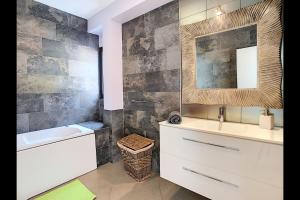 a bathroom with a sink and a mirror at Villa do Paul by LovelyStay in Paul do Mar +46 photos