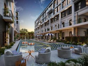 an exterior view of a building with a swimming pool at BlackBrick Bryanston in Johannesburg