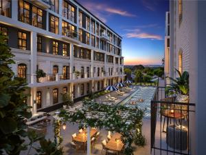 a view of a building with tables and chairs at BlackBrick Bryanston in Johannesburg