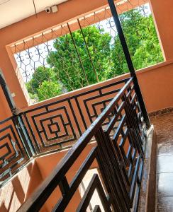 an overhead view of a staircase with a window at Mama Maendeleo Resort in Hindi