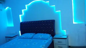 Hotel Buza 객실 침대