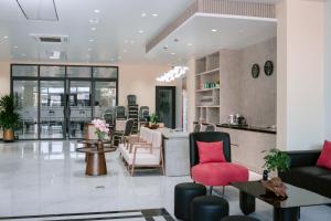 a salon with chairs and a waiting room at Horizon Minh Chau Hotel in Quang Ninh