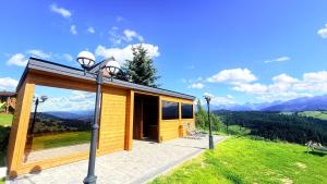 a house on a hill with a view at Willa Sulejowka in Poronin