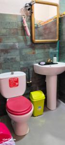 a bathroom with a toilet and a sink at Lindas Vistas in Tías