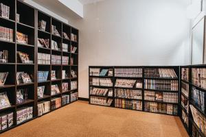 a library with many shelves of dvds at Hamamatsu Station Hotel in Hamamatsu