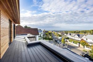 a roof deck with a view of a city at Designer Haus - Pool - Sea Views - 7BR - Sleeps 14 in Brighton & Hove