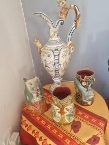 a vase sitting on top of a table with vases at Cabesthotes in Cabestany