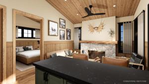 a living room with a fireplace and a bedroom at Tekarra Lodge in Jasper +3 photos