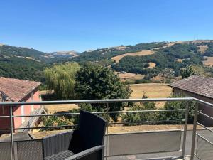 a balcony with a view of the countryside at Résidence la Marquise in Trébas