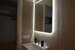 a bathroom with a sink and a mirror at Hotel Venere in Ascea