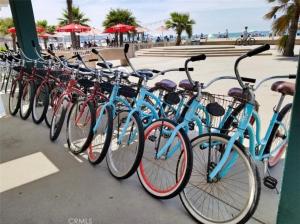 a row of bikes parked next to the beach at Private Dana Point Beach Studio in Dana Point