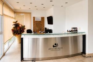 an office lobby with an aosote agent counter at Altos de Alem in Federación +26 photos