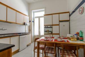 Kuchyň nebo kuchyňský kout v ubytování Casa Michelangelo