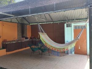 a hammock hanging from awning on a patio at Elsie Place in San Mateo