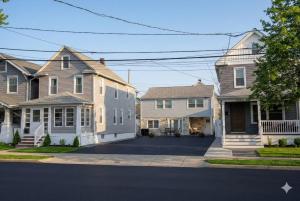 a row of houses in a residential neighborhood at Bradley Beach Compound in Bradley Beach