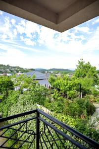 a view from the balcony of a house at Kutaisi Grand Suites in Kutaisi