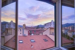 a view of a city from a window at Signature Design & Panoramic Views in Montecatini Terme