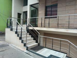 a set of stairs in front of a building at Hotel ESS Paradise in Coimbatore