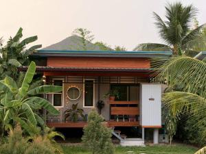 a house in the middle of a forest at CS phangan Villa in Ko Phangan