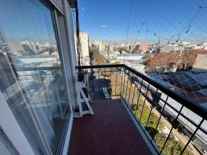 a balcony with a view of a city at my depto in Vicente López