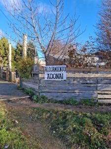 a sign on a fence that saysulumulum abnormal at Alojamiento Adonai in Tolhuin