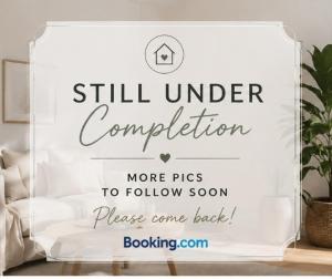 a sign that says still under complication in a bedroom at The Ashington Collection in Ashington