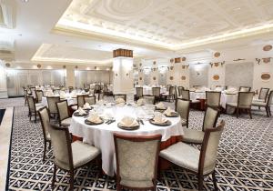Restoran või mõni muu söögikoht majutusasutuses Legend Palace Hotel