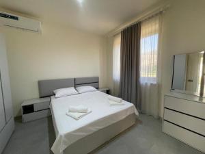Katil atau katil-katil dalam bilik di Lizet Guest House Areni