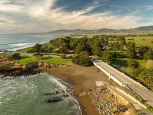 an aerial view of a bridge over the ocean at Oceanpoint Ranch in Cambria