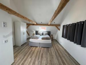 a bedroom with a bed in a room at Charming Retreats Hasselfelde in Hasselfelde